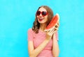 Fashion portrait happy smiling young woman is holding slice of watermelon Royalty Free Stock Photo