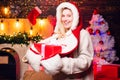 Fashion portrait of model girl indoors with Christmas tree. Sensual young girl. Christmas fashion. Seasonal Christmas Royalty Free Stock Photo