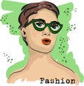 Fashion portrait of a model in green glasses