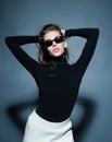 Fashion portrait. Portrait of seductive elegant young woman in black sunglasses. Royalty Free Stock Photo