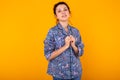 Fashion portrait pretty cool girl having fun over colorful yellow background. Royalty Free Stock Photo