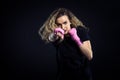 Fashion portrait of strong active kick boxing woman training.