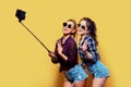 Fashion portrait of two friends posing. Royalty Free Stock Photo