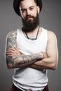 Smiling Hipster boy. handsome man in hat Royalty Free Stock Photo