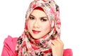 Fashion portrait of young beautiful muslim woman with red scarf Royalty Free Stock Photo