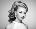 Fashion portrait of young beautiful woman with elegant hairstyle Royalty Free Stock Photo