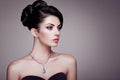 Fashion portrait of young beautiful woman with elegant hairstyle Royalty Free Stock Photo