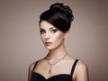 Fashion portrait of young beautiful woman with elegant hairstyle Royalty Free Stock Photo