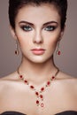 Fashion portrait of young beautiful woman with jewelry Royalty Free Stock Photo