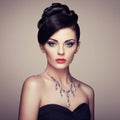 Fashion portrait of young beautiful woman with jewelry Royalty Free Stock Photo