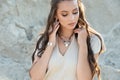 Fashion portrait of young beautiful woman with jewelry. Brunette girl. Perfect make-up. Beauty style woman with silver accessories Royalty Free Stock Photo