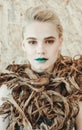 Fashion portrait of Young blond woman.Beautiful Girl with green lips. Concept Mother Nature Royalty Free Stock Photo