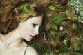 Fashion portrait of young sensual woman in garden Royalty Free Stock Photo