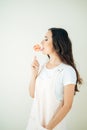 Coquette. Funny Quaint Brunette with Colorful Lollipop Royalty Free Stock Photo