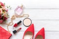 Fashion red bag and shoe woman accessories background. Royalty Free Stock Photo