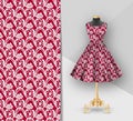 Fashion red fabric printed dress on a black mannequin. Dress clothes realistic 3d mockup. Seamless crimson Flower pattern in Royalty Free Stock Photo
