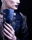 Fashion Rocker Style Model Girl Portrait. Hairstyle. Punk Woman Makeup, Hairdo and black Nails. Smoky Eyes