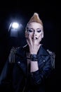 Fashion Rocker Style Model Girl Portrait. Hairstyle. Punk Woman Makeup, Hairdo and black Nails. Smoky Eyes hairstyle