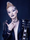 Fashion Rocker Style Model Girl Portrait. Hairstyle. Punk Woman Makeup, Hairdo and black Nails. Smoky Eyes