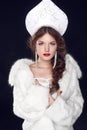 Fashion Russian girl model in slavic exclusive design clothes on