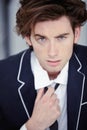Fashion, serious and portrait of man in studio with formal, classy and elegant outfit for confidence. Handsome, suit and