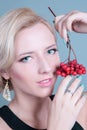 Fashion girl with red berries Royalty Free Stock Photo