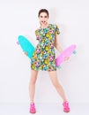 Fashion vogue model in colorful dress with