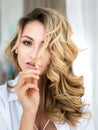 Fashion woman`s body parts in boudoir room near the window. Close up portrait of sensual beautiful woman. bride