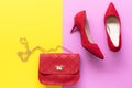 Fashion shoe and bag woman accessories set. Trendy red fashion shoes heels and red bag. Royalty Free Stock Photo