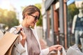 Fashion, shopping bag or happy rich woman in city walking on urban street for boutique retail sale or clothes Royalty Free Stock Photo