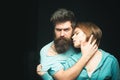 Fashion shot of couple after haircut. Hairstyle concept. Man with stylish beard and mustache and girl with fresh haircut Royalty Free Stock Photo