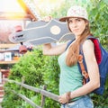 Fashion skateboarder young woman with a skateboard. Adventure, summer trip.