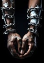 Fashion social Concept. Man bound in chains. illuminated with dynamic composition and dramatic lighting Royalty Free Stock Photo