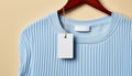 Fashion store sale Blue shirt, elegant design, hanging on coathanger generated by AI