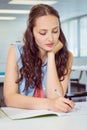 Fashion student taking notes in class Royalty Free Stock Photo