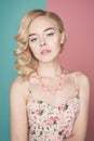 Blonde woman with color makup on colorful background Royalty Free Stock Photo