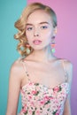 Blonde woman with color makup on colorful background Royalty Free Stock Photo