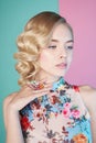 Blonde woman with color makup on colorful background Royalty Free Stock Photo