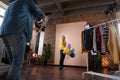 Fashion studio portrait of a happy young woman with balloons , backstage of photoshooting . Royalty Free Stock Photo