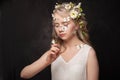 Fashion style beauty romantic portrait of young pretty beautiful woman with long curly hair posing with butterfly Royalty Free Stock Photo