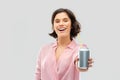 Woman drinking soda from can with paper straw Royalty Free Stock Photo