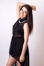 Fashion style studio photo of a cute brunette Royalty Free Stock Photo