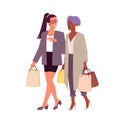 Fashion stylish girls with shopping bags, young happy fashionable friends walking Royalty Free Stock Photo