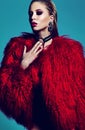 Fashion stylish swag model in fur coat Royalty Free Stock Photo