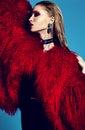 Fashion stylish swag model in fur coat Royalty Free Stock Photo