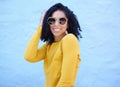 Fashion sunglasses, portrait and black woman on blue background, excited face and trendy cool clothes. Summer, shades Royalty Free Stock Photo