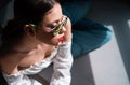 Fashion sunglasses. Young woman in glasses. Sensual model girl posing. Royalty Free Stock Photo