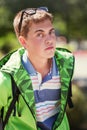 Fashion teen boy in a hoodie on city street Royalty Free Stock Photo