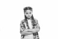 Fashion trend. Girl confidently crossed arms on chest. Child little girl colorful braids fashionable hairstyle isolated