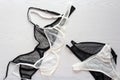 Fashion trendy lace lingerie. Different panties and bra on white wooden background. Beautiful sets to choose from. Colorful women